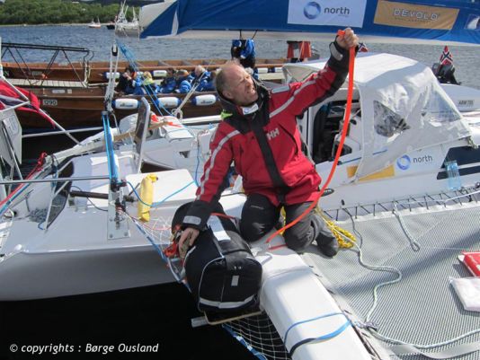 17 July / Attaching the life-raft onto the aft beam.