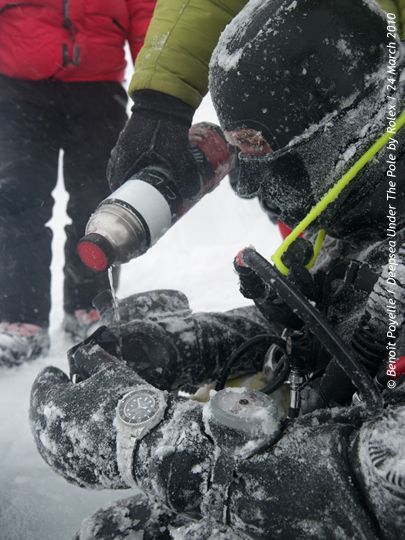 Drinking something hot and being cheered up right after the dive was quite necessary because of the cold and the stress of having been under the ice far from the others.