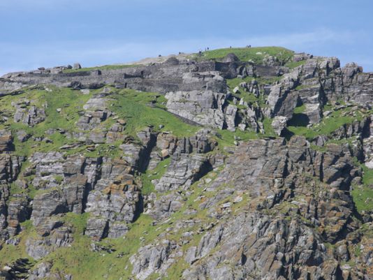 4 June. Great Skelligs,  the neighbor island, this one is green and stands at 214 metres above the ocean with its monastery dating back from the 14th century that can be reached via a 600 steps stairway, cut from the stone itself.