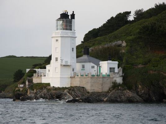 18 May 2011, 6.30 am, they have reached Start Point. St Anthony's head lighthouse painted in white signals the mouth of the Fal river.