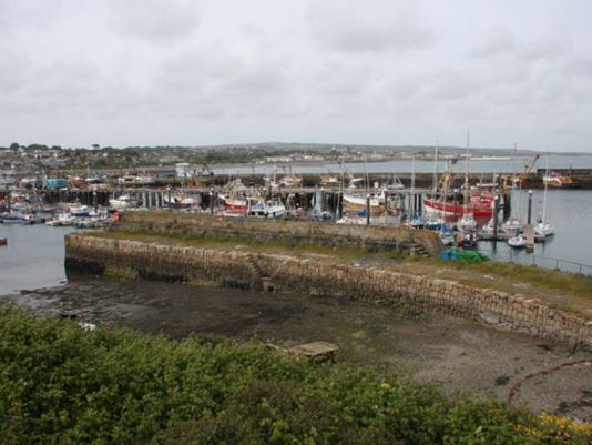 The old port of Newlyn. The main jetee was built in 1980 and inaugurated by her Majesty Queen Elisabeth II