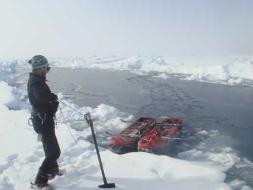 Lead crossing techniques: To cross wider leads, we tie the sledges together and use them as a boat.