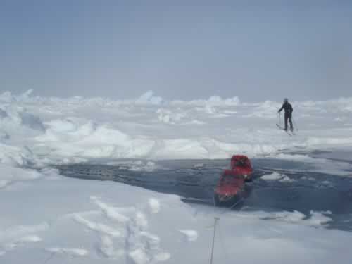 Lead crossing techniques: Pulling the sledges across a lead.