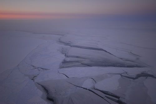 As they approach the drop-off point, the two men can already look out and see the state of the ice.