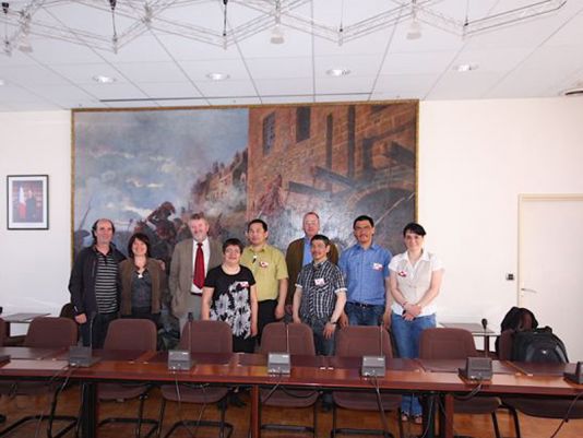 The twinning committee in the Granville local council meeting room. From Left to Right:
Pierre Auzias, Annie Kerouedan (Uummannaq-GL.),Mr Mayor Daniel Caruhel, Mayor of Granville, Émilie Svane, Mr Mayor Daniel Caruhel's wife, Mr Mayor Jess Svane , Qaasuitsup village (Ilulissat-GL), Henrik  Rafn,  council advisor , Qaasuitsup, Ole Zeeb  Advisor for education and culture, Qaasuitsup , Karl Kristian Kruse Uummannaq council delegate, Dorthe Løvstrom Executive secretary, Qaasuitsup.