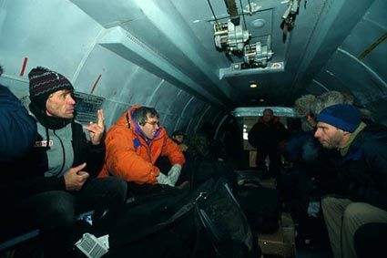 Saturday, 23 February, Tiksi / Deep down the MI8's breakdown was not as serious as all that. In deed, on that Saturday, 23 February, the men woke up at dawn. It was the local authorities that came to bring them the good news: the chopper would be ready to leave at about 10am. Here, the crew inside an Antonov between Khatanga and Tiksi.