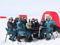 The team took time out from packing up to hold an Arctic royal wedding ‘street party’ and toast